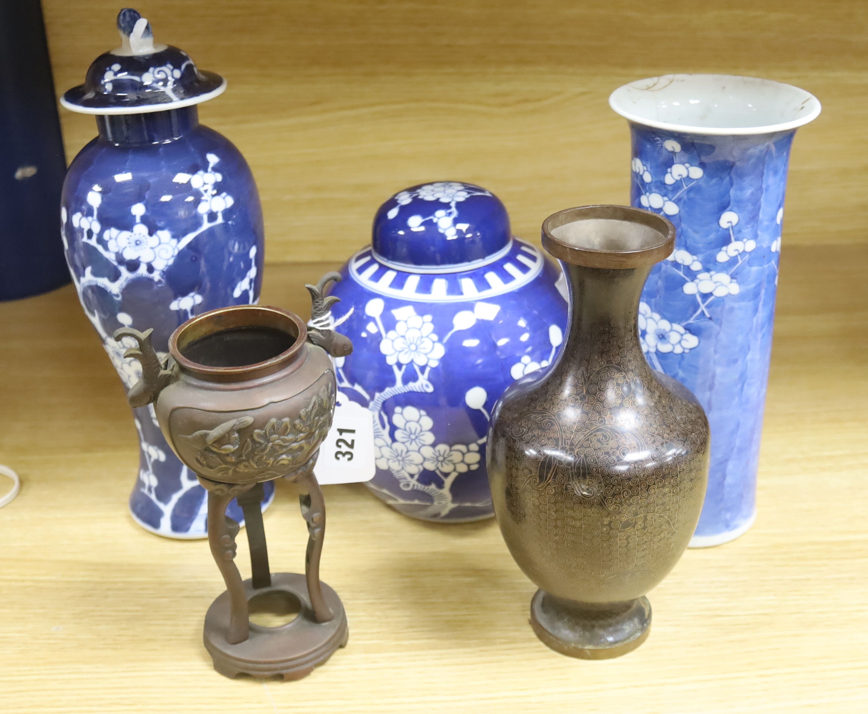 A Chinese blue and white cylindrical vase, another vase and cover and a blue and white jar and cover, together with a cloisonne vase and a bronze censer, tallest 32cm